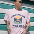 "Stupid Canadian Wolf Bird" Hockey Romance T-Shirt - Funny LGBT Hockey Fan Gift, BookTok Sarcastic Sports Romance Tee, Unisex Pucking Around Inspired Top